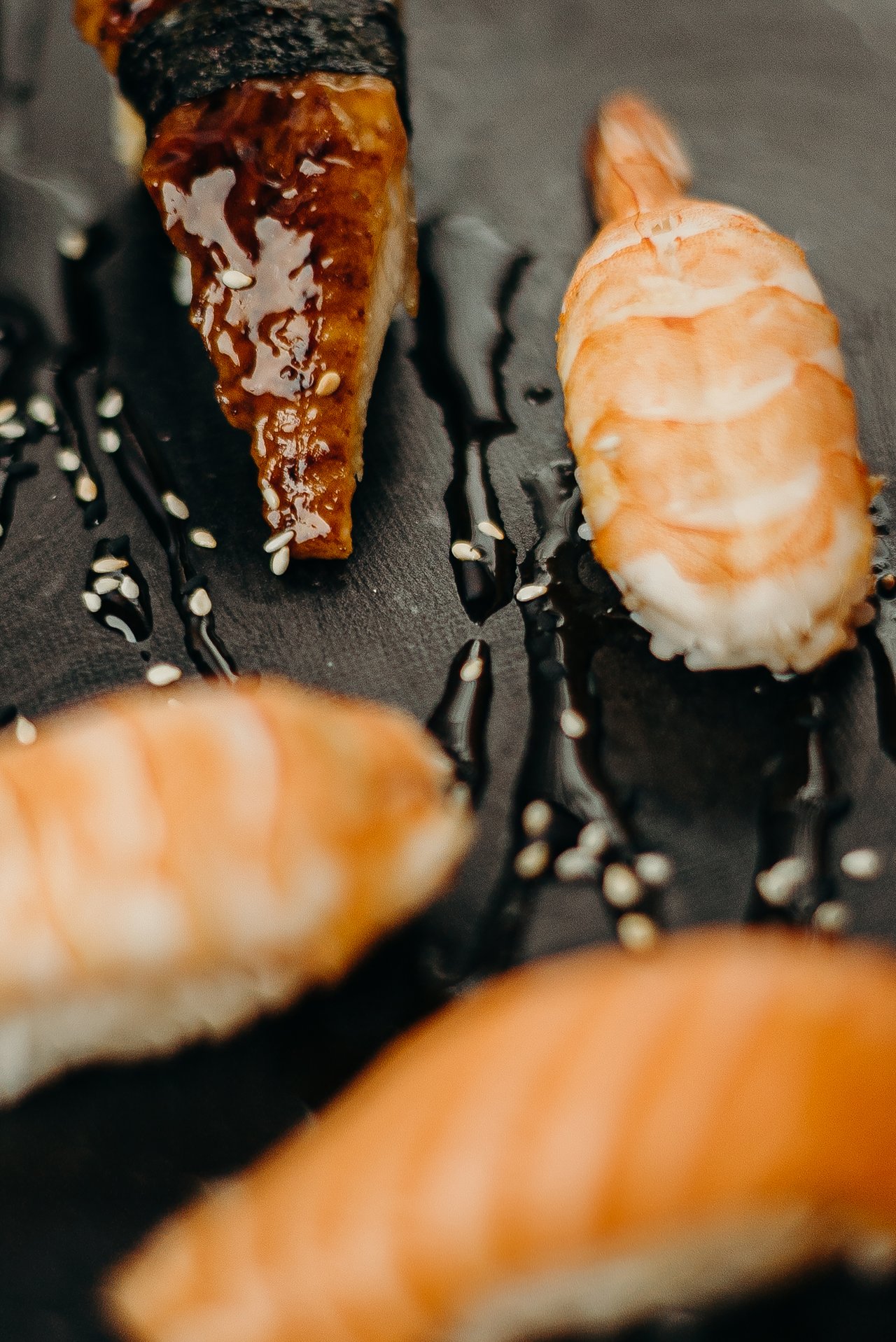 Shot of nigiri sushi displayed on a dish.